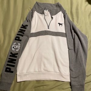 Pink half zip. Size medium.